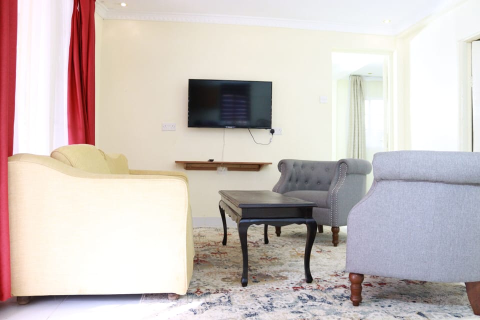 Family Cottage, Balcony | Living area | TV