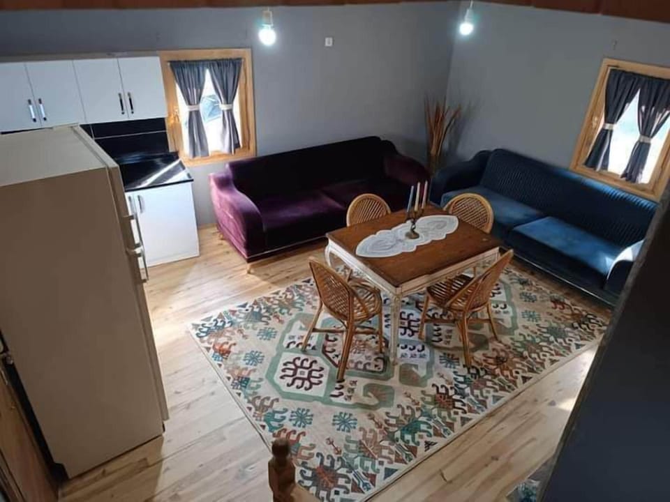 Romantic Villa | Living area | 32-inch LED TV with cable channels