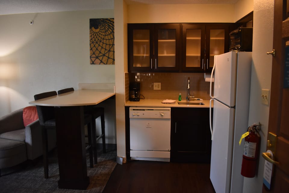 Suite, 2 Bedrooms, Kitchen | Living area | 32-inch TV with satellite channels, pay movies