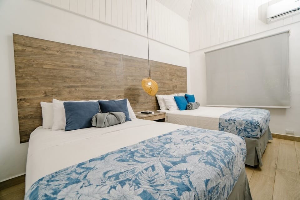 Standard Quadruple Room, 2 Double Beds, Non Smoking | WiFi (free), bed sheets