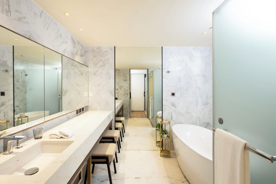 Family Quad Room | Bathroom | Designer toiletries, hair dryer, bathrobes, towels