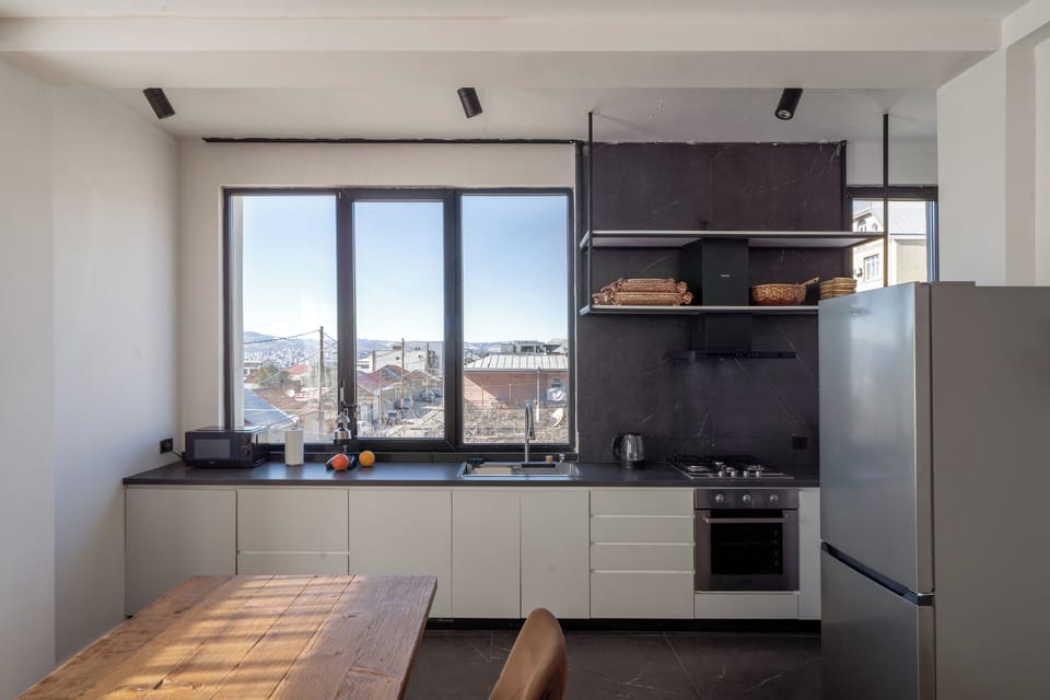 Family Apartment | Private kitchen | Full-size fridge, microwave, oven, stovetop