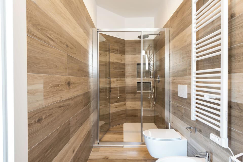 Superior Triple Room | Bathroom | Shower, hair dryer, bidet, towels