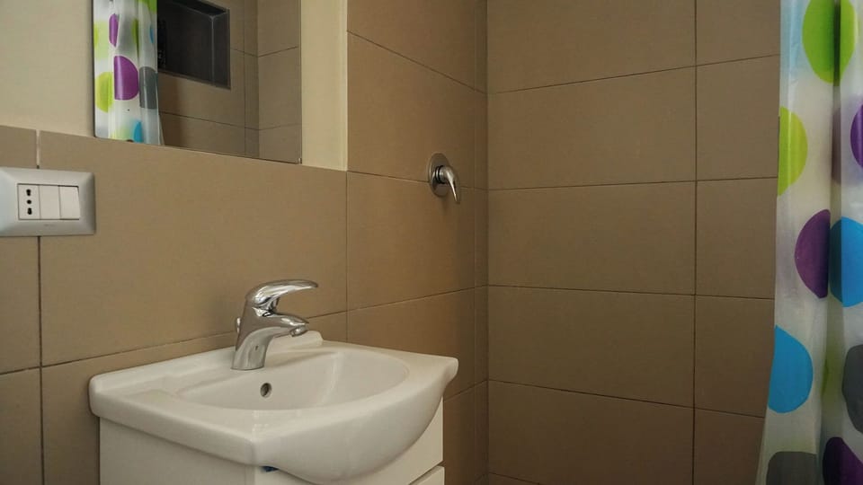 Apartment, Pool View | Bathroom | Shower, hair dryer, towels, soap