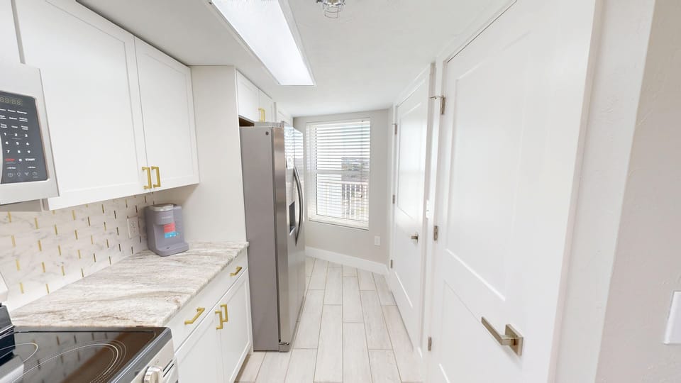 Condo, 2 Bedrooms | Private kitchen | Coffee/tea maker, fridge, oven, toaster