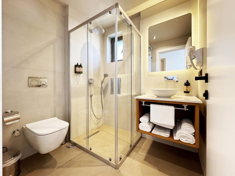 Shower, rainfall showerhead, hair dryer, slippers