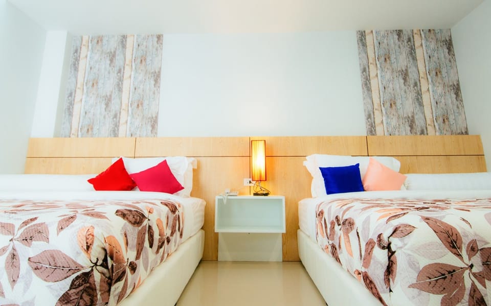Family Room | Minibar, desk, blackout drapes, soundproofing
