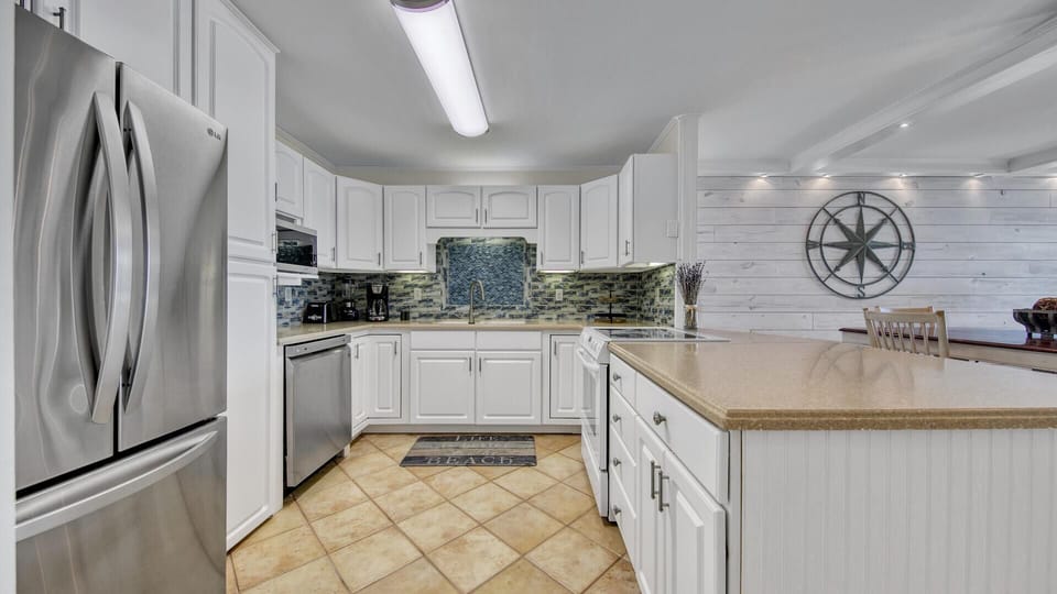 Condo, Multiple Beds, Bay View (Dolphin Point 502B) | Private kitchen | Oven, toaster
