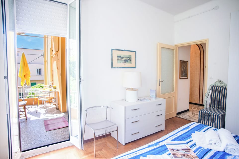 Family Apartment, Multiple Bedrooms (Spazioso App.To Mare E Sport) | 2 bedrooms, iron/ironing board, bed sheets