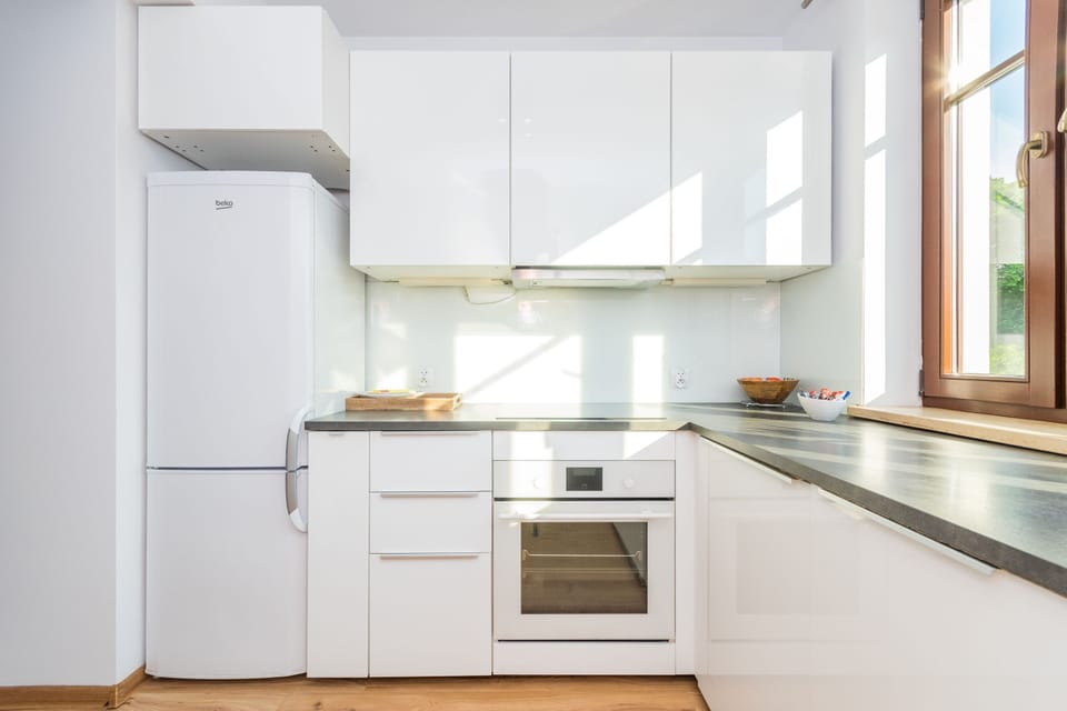 Comfort Apartment, Balcony, Courtyard View | Private kitchen | Fridge, oven, stovetop, dishwasher