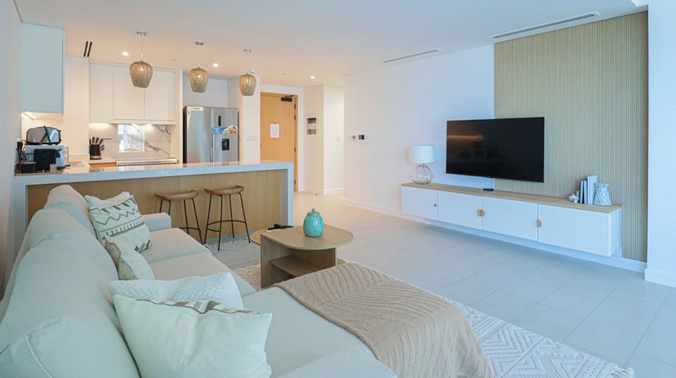 Exclusive Apartment | Living area | 55-inch Smart TV with cable channels