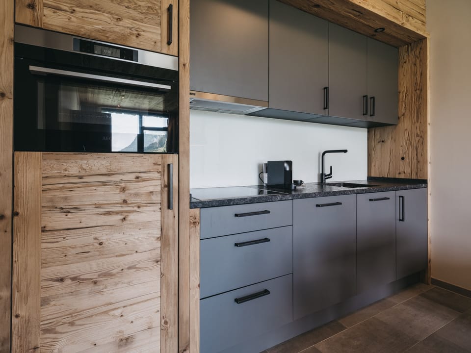 Three-room apartment Superior II | Private kitchen | Fridge, oven, stovetop, dishwasher