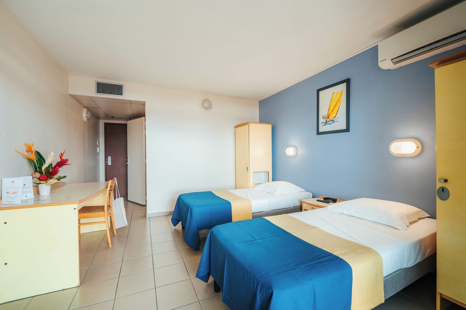 Standard Room, 2 Twin Beds | Desk, blackout drapes, iron/ironing board, free WiFi