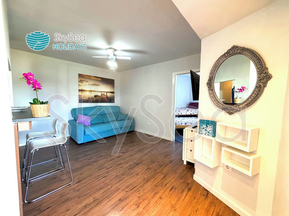 Family Apartment, 2 Bedrooms, Pool View | Living area | Flat-screen TV