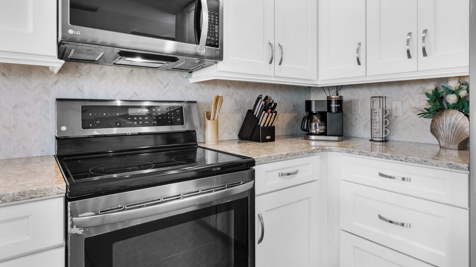 Townhome, Multiple Beds, Patio, Ocean View (Sea Haunts 1A) | Private kitchen | Dining table