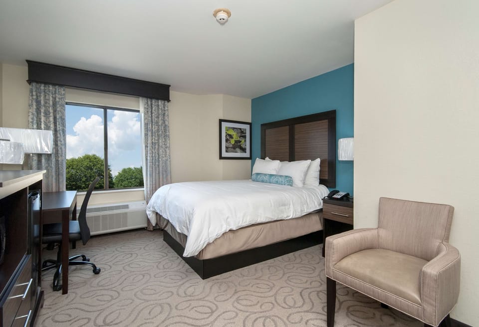 Pillowtop beds, desk, laptop workspace, blackout drapes