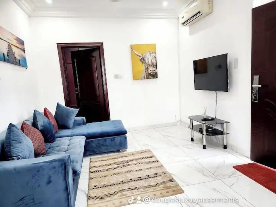 Apartment | Living area | 45-inch plasma TV with cable channels, Netflix, streaming services