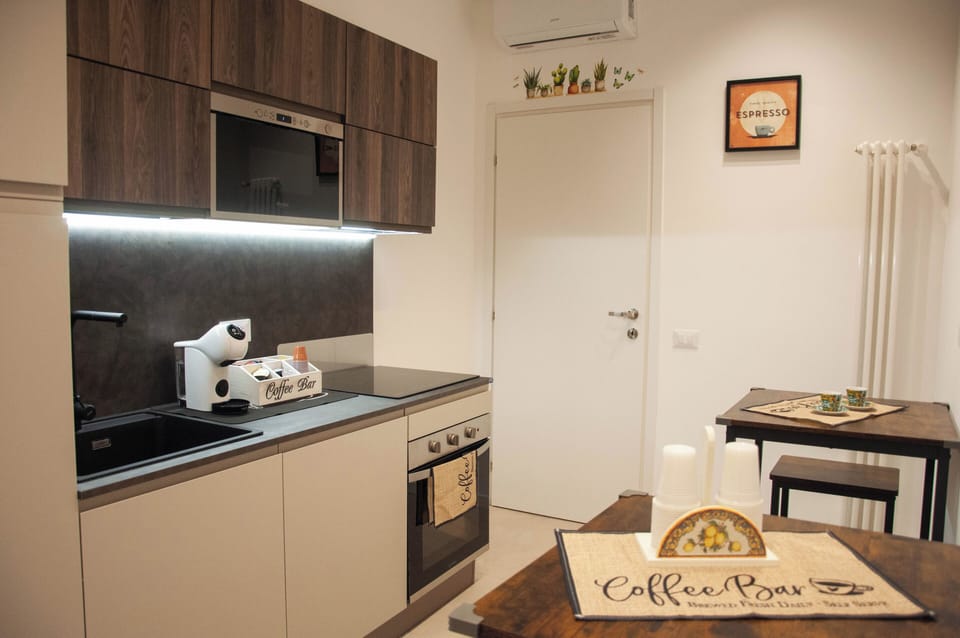 Shared fridge, microwave, coffee/tea maker, electric kettle