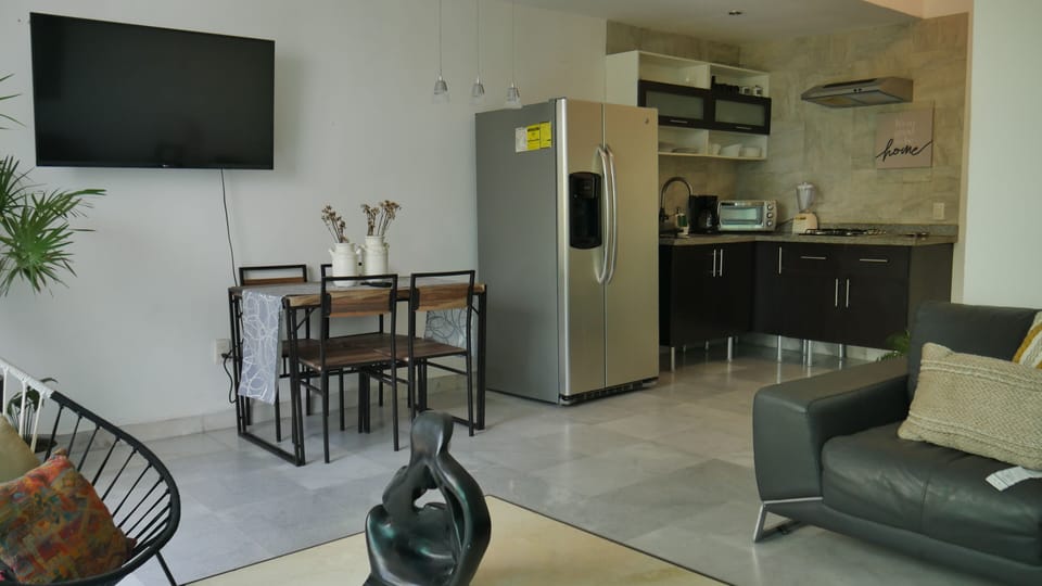 Junior Apartment | Living area | 43-inch Smart TV with satellite channels