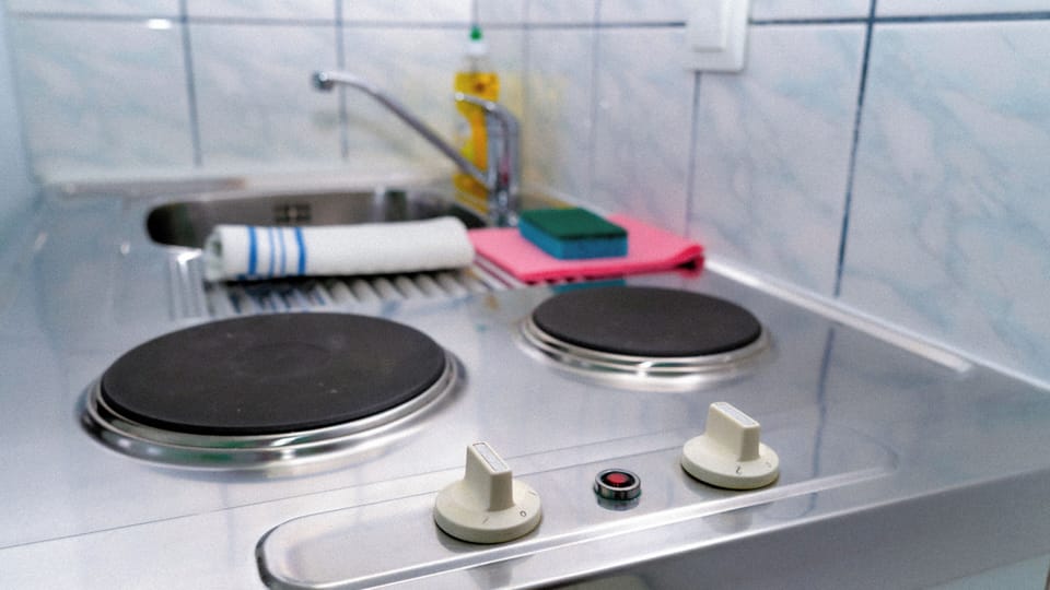 Mini-fridge, stovetop, electric kettle, toaster