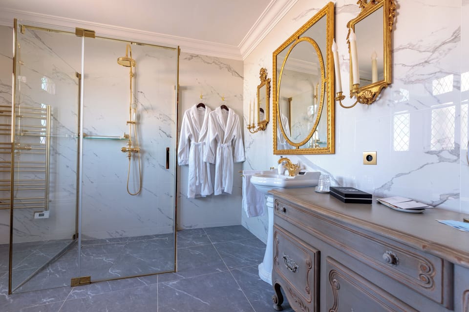 Junior Room | Bathroom | Shower, designer toiletries, hair dryer, bathrobes
