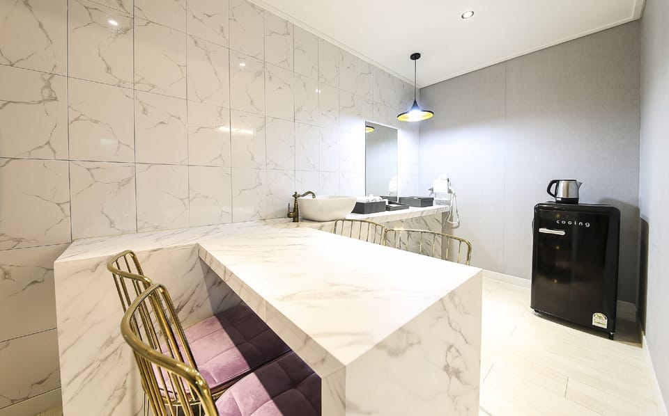 Premium Double Room, City View | Living area | 65-inch LED TV with cable channels, Netflix, heated floors