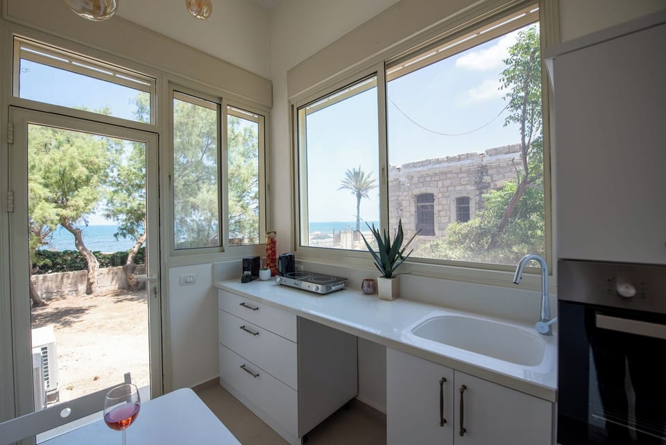 Luxury Apartment | Private kitchen | Espresso maker, coffee/tea maker, electric kettle, dining tables