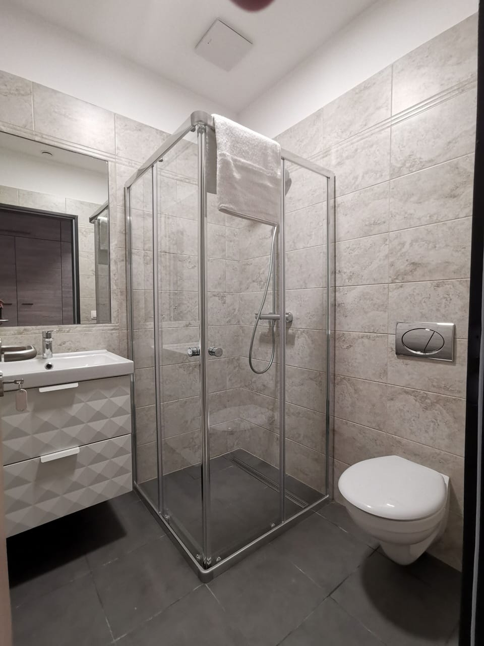 Quadruple Room | Bathroom | Hair dryer, towels, toilet paper