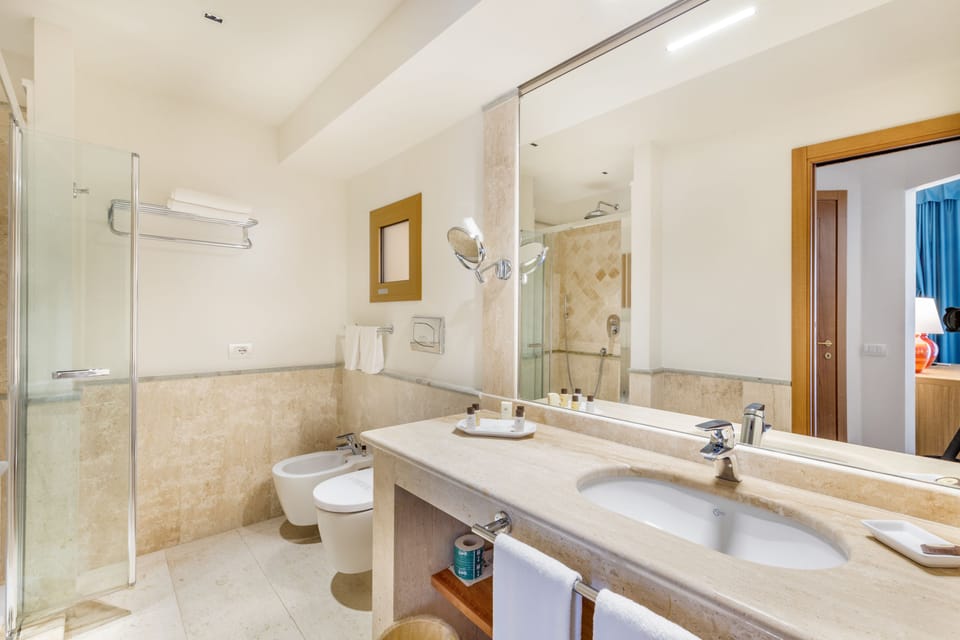 Shower, free toiletries, hair dryer, bathrobes