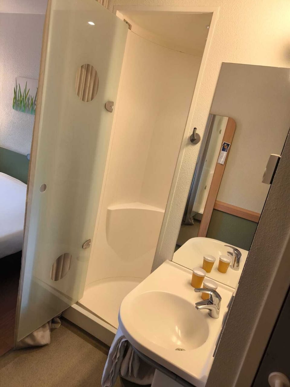 Shower, rainfall showerhead, hair dryer, towels
