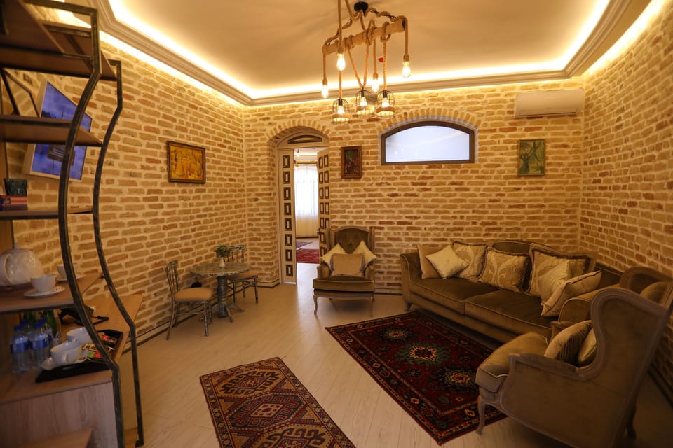 Luxury Suite, City View | Soundproofing, WiFi (free), bed sheets