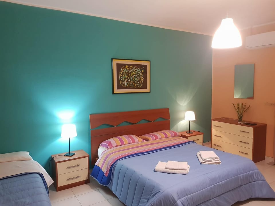 Triple Room, Private Bathroom (external) | Down comforters, desk, free WiFi, bed sheets
