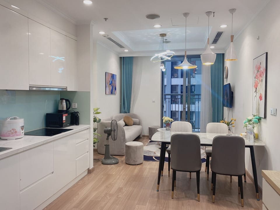 Business Apartment | Living area | Flat-screen TV