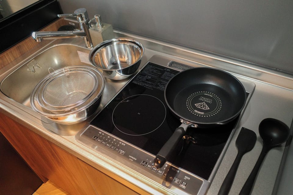 Accommodates three-person, Non Smoking | Private kitchen | Full-size fridge, microwave, stovetop, cookware/dishes/utensils