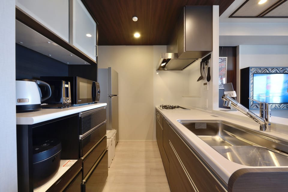 Apartment | Private kitchen | Fridge, microwave, stovetop, electric kettle