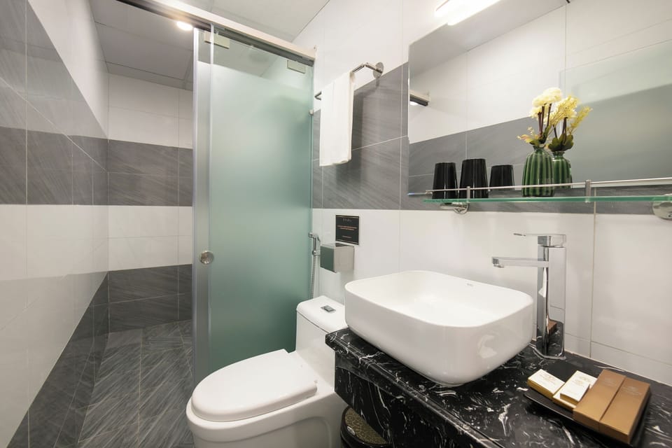 Shower, hydromassage showerhead, designer toiletries, hair dryer