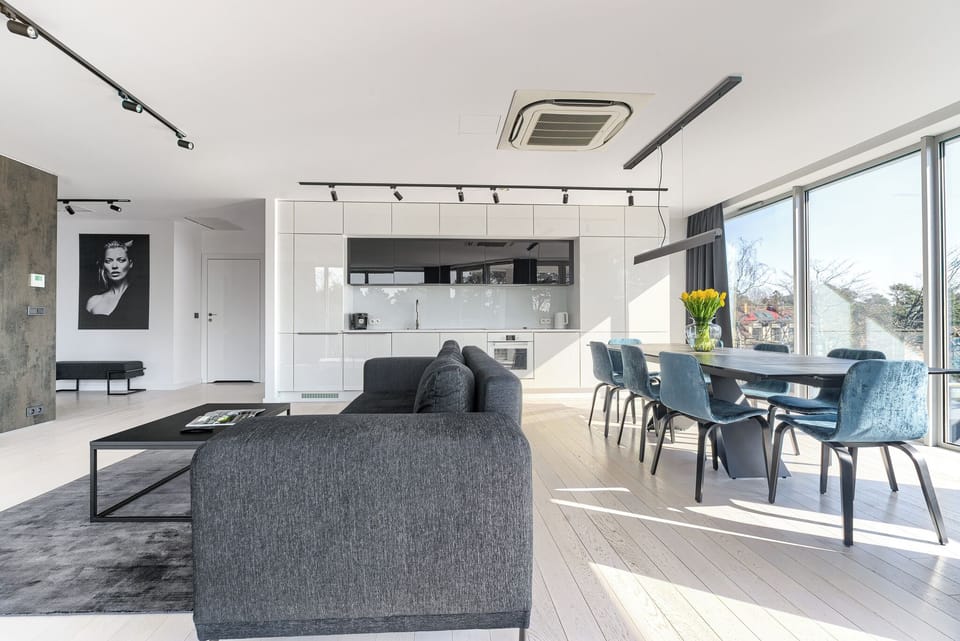 Executive Apartment, Partial Sea View | Living area | Flat-screen TV