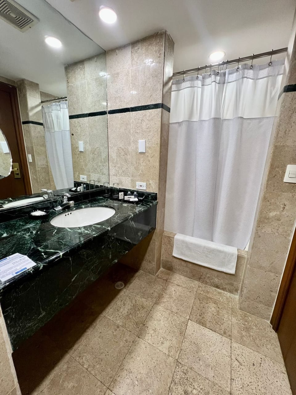 Hair dryer, towels, soap, shampoo