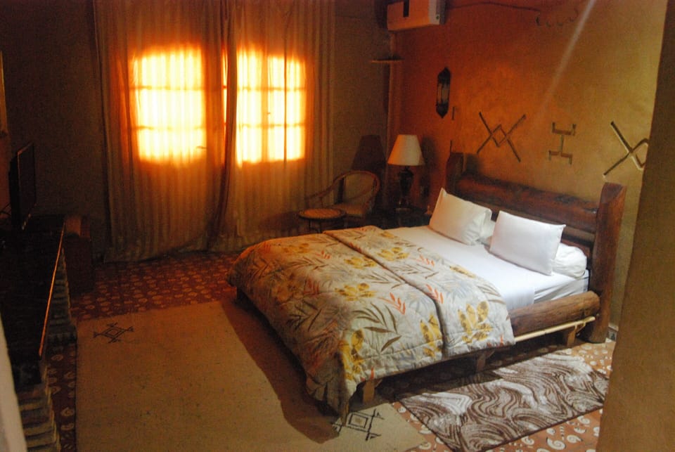 Economy Double Room, Pool View | Iron/ironing board, WiFi (free)