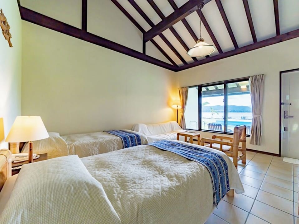Superior Twin Room, Partial Ocean View | In-room safe, blackout drapes, iron/ironing board, WiFi (free)