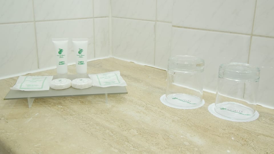 Separate tub and shower, rainfall showerhead, hair dryer, towels