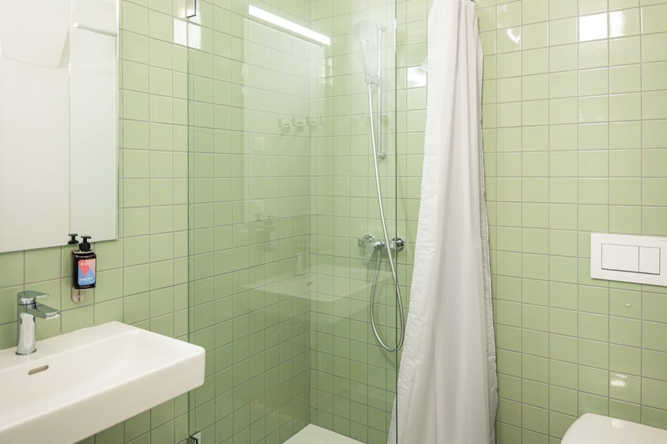 Shower, heated floors, towels, soap