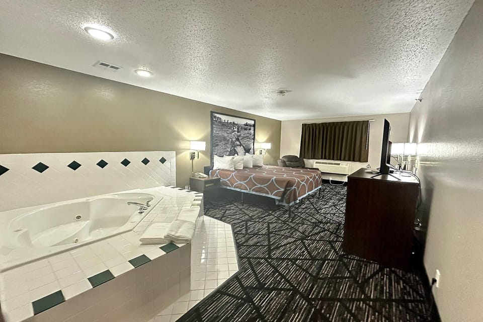 Studio Suite, 1 King Bed, Non Smoking | Individually decorated, individually furnished, desk, blackout drapes