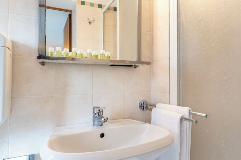 Classic Double Room, Courtyard View | Desk, laptop workspace, WiFi (free), bed sheets