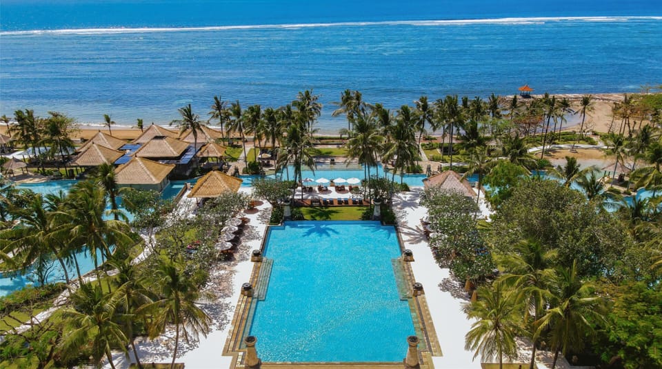 On the beach, sun loungers, beach umbrellas, beach towels