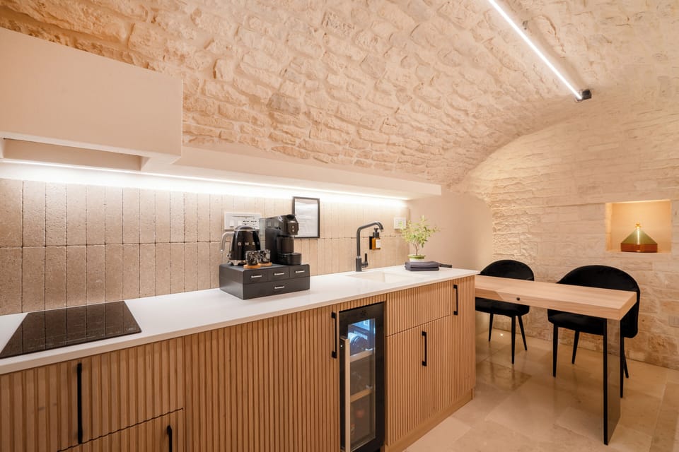 Luxury Suite, 1 King Bed | Private kitchen | Full-size fridge, stovetop, espresso maker, coffee/tea maker