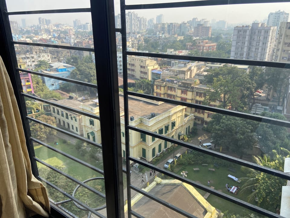 Luxury Room, Private Bathroom, City View | Desk, laptop workspace, blackout drapes, iron/ironing board