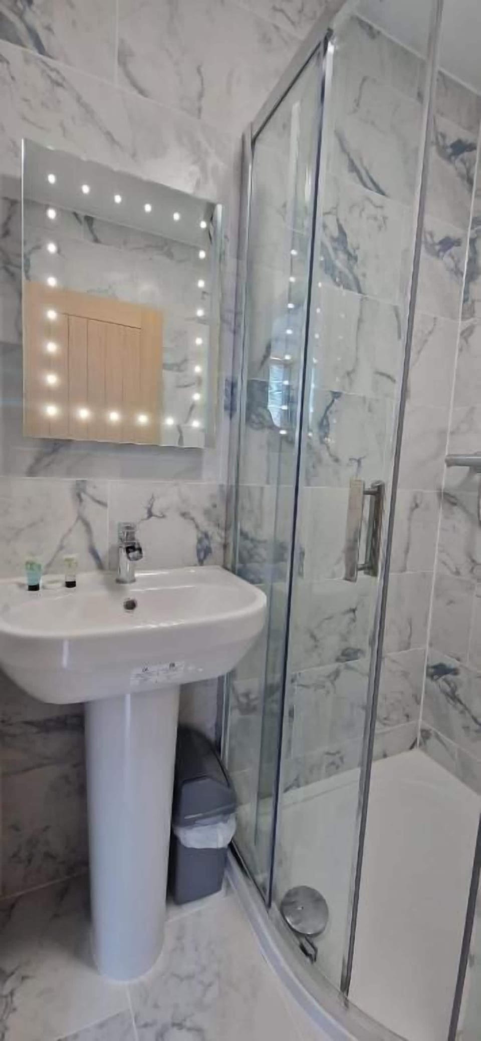 Rainfall showerhead, free toiletries, hair dryer, towels