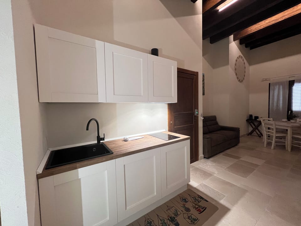 Standard Apartment, 1 Double Bed with Sofa bed, Kitchenette, Partial Sea View | Private kitchen | Mini-fridge