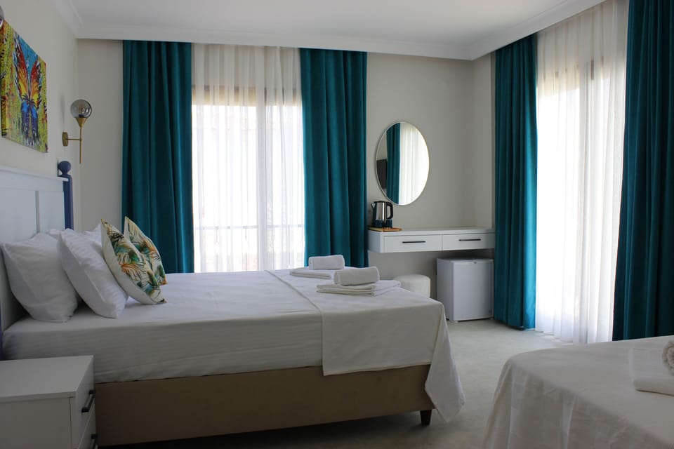 Executive Triple Room, Balcony, City View | Free WiFi